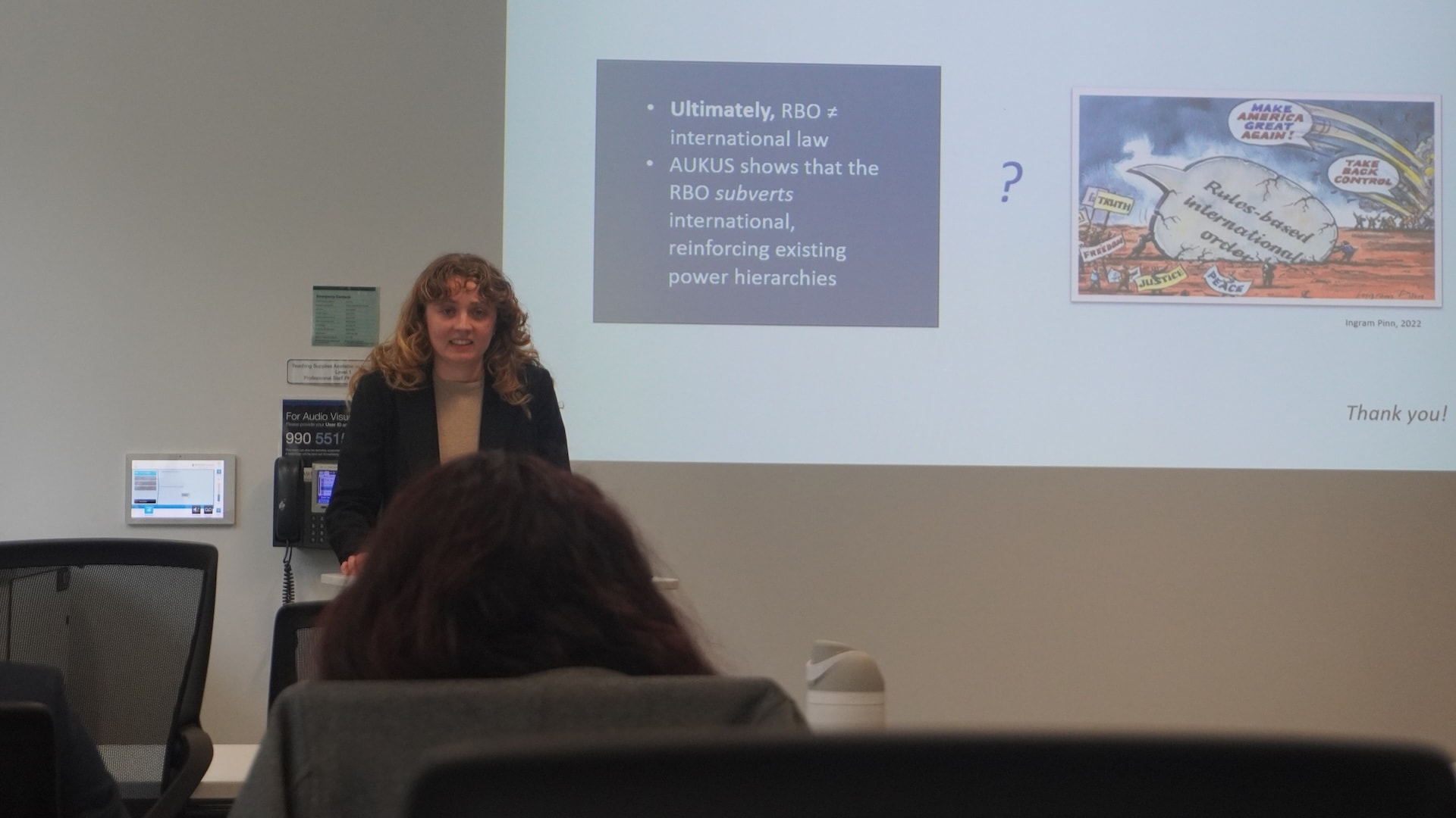 Jane Nicholls speaking at a lectern