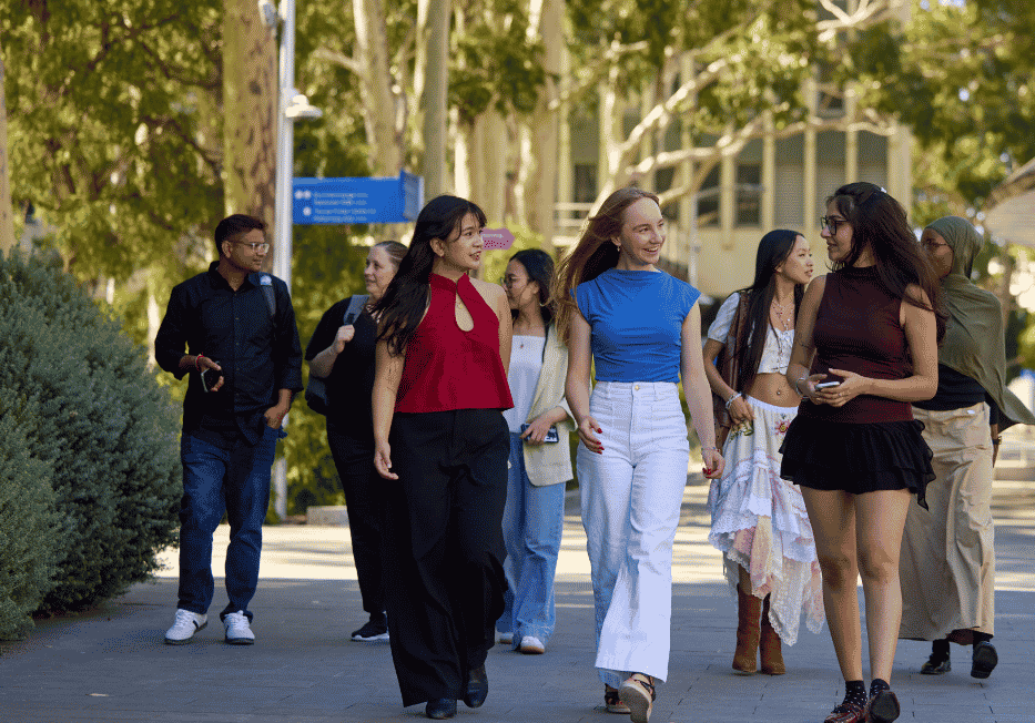 A group of students walk together at Clayton campus