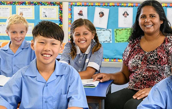 Teacher in a multi-ethnic classroom