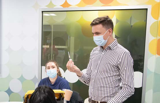 Senior Lecturer and pharmacist Steven Walker demonstrating vaccination administration to fourth year pharmacy students
