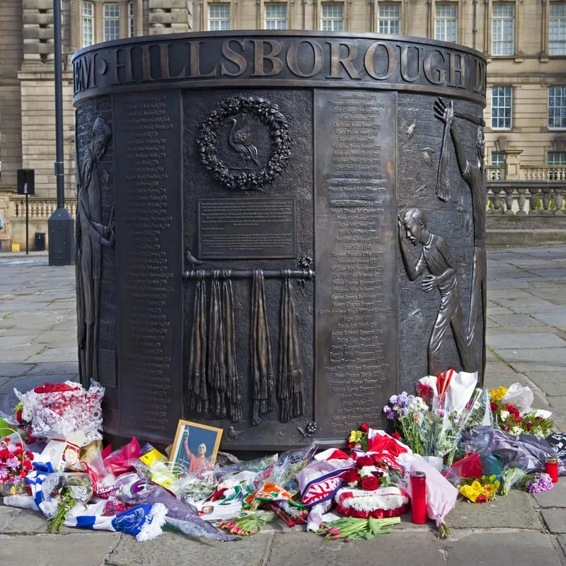 Memorial with flowers at base