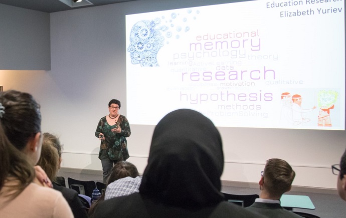 Elizabeth Yuriev giving a presentation about education research