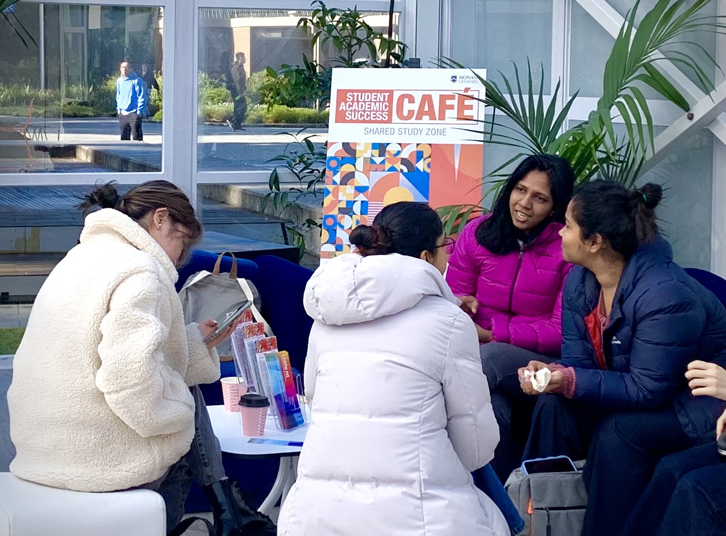 Photo of students and staff at the SAS cafe.
