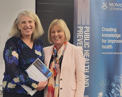 Michelle Brinkhoff with Master of Occupational and Environmental Health coordinator Prof Karen Walker-Bone