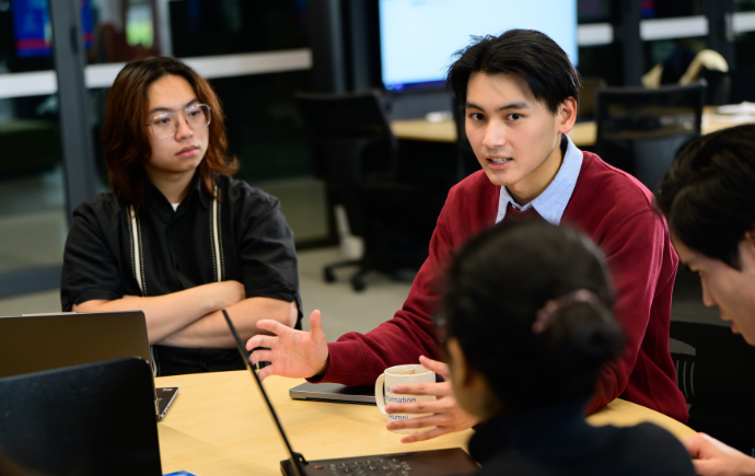 Student presenting their assignment