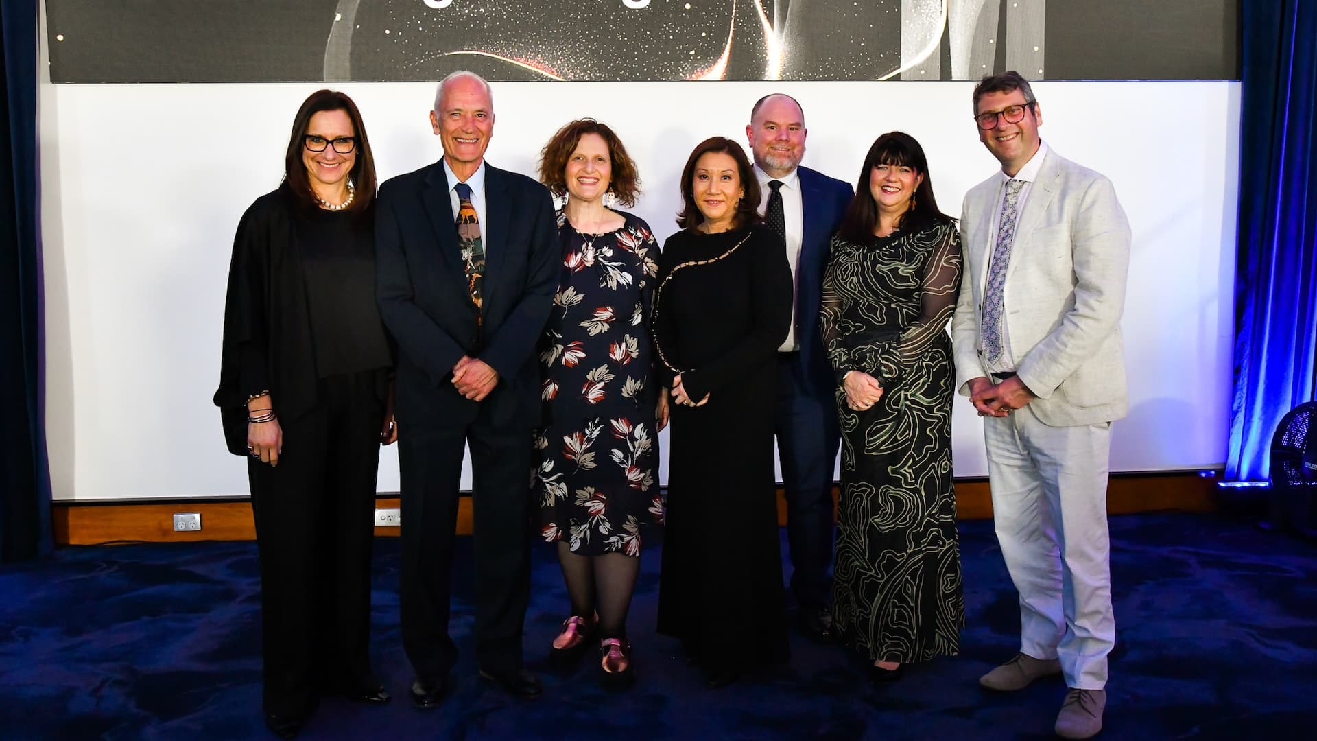 Jacqui Weinberg, Professor Jeff Giddings, Sara Koval, Melissa Fletcher, Associate Professor Joel Townsend, Sally Anderson and Associate Professor Ross Hyams from the Monash Law Clinical Program at the 2025 Monash Law Gala Dinner.