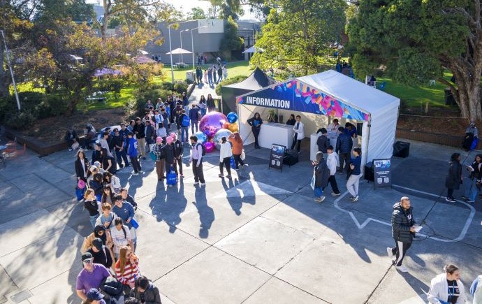 Students lining up for information at Clayton Open Day
