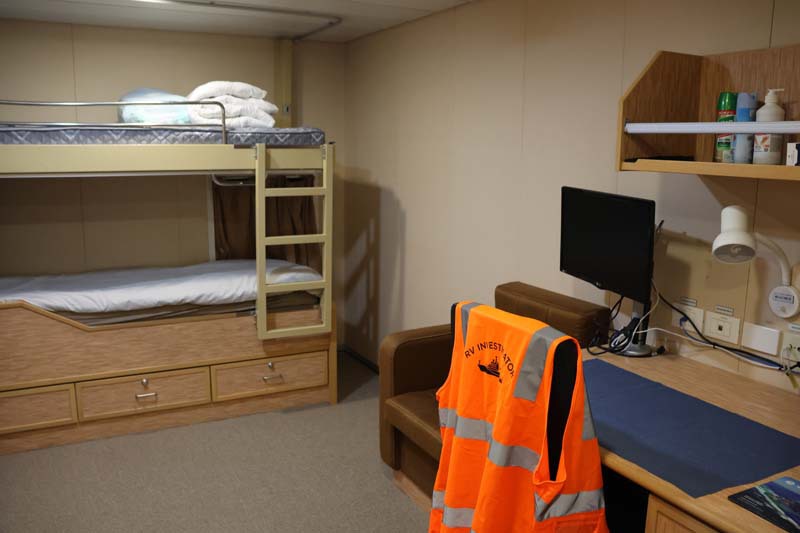 RV Investigator bunk room table and beds