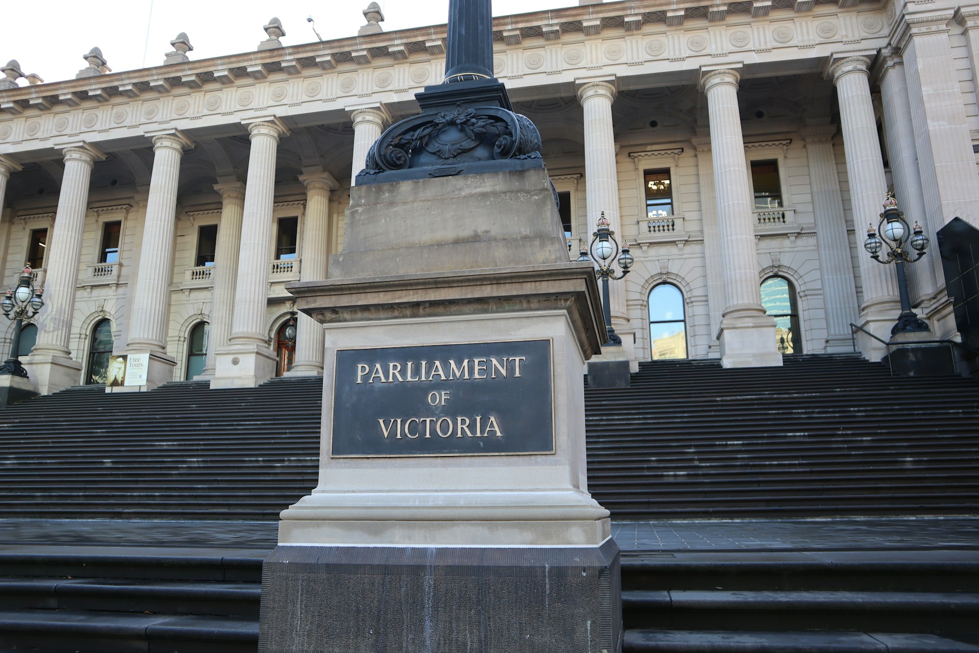 The steps and sign post of the Parliament of Victoria. 