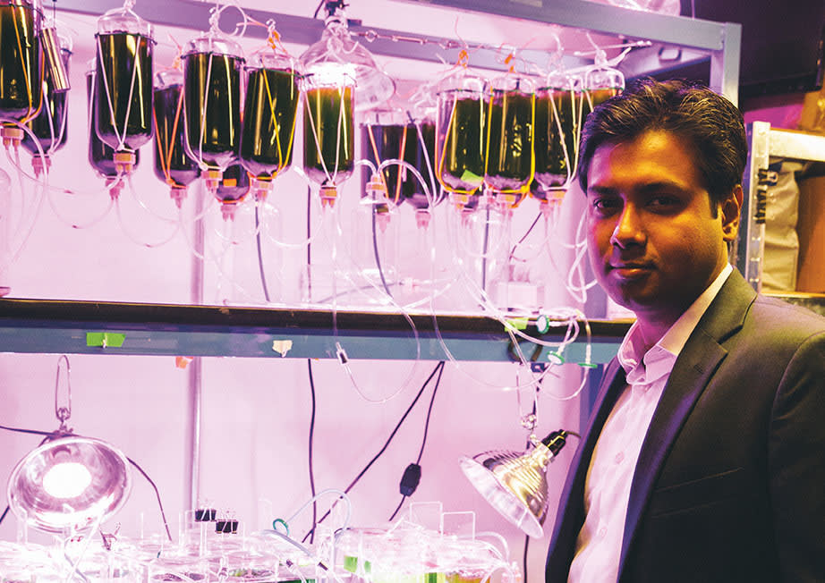 Dr Das standing in his lab