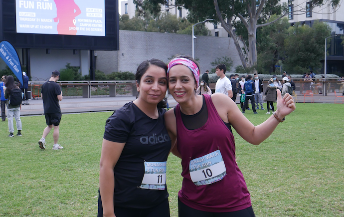 two monash participants posing after fun run