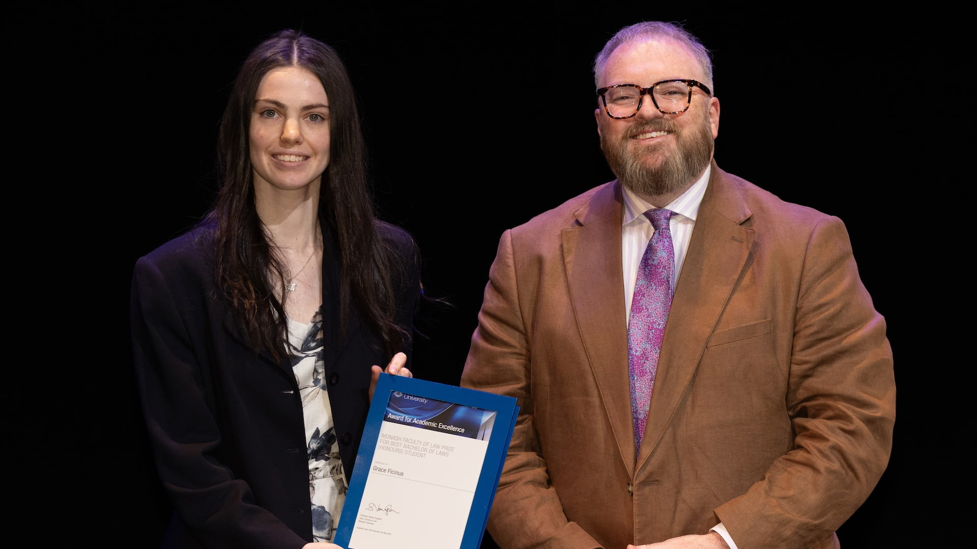 Monash Faculty of Law Prize for Best Bachelor of Laws (Honours) Student, Grace Ficinus with Professor Steven Vaughan.
