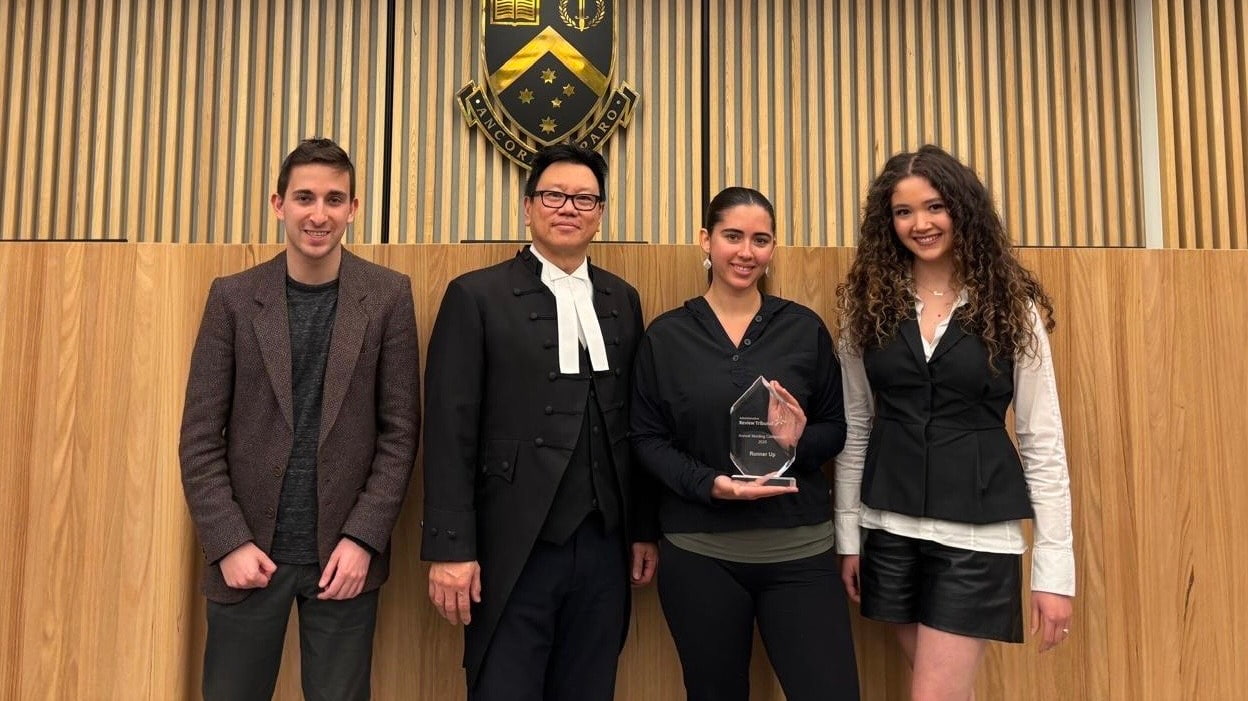 Monash Grand Finalist team: Wade Gittleson, Chief Moot Coach William Lye OAM KC, Shailee Carmeli and Sara Scully 